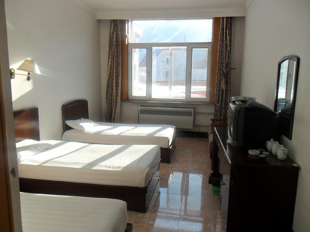 Yabuli Xintong Hotel Shangzhi Habitación foto